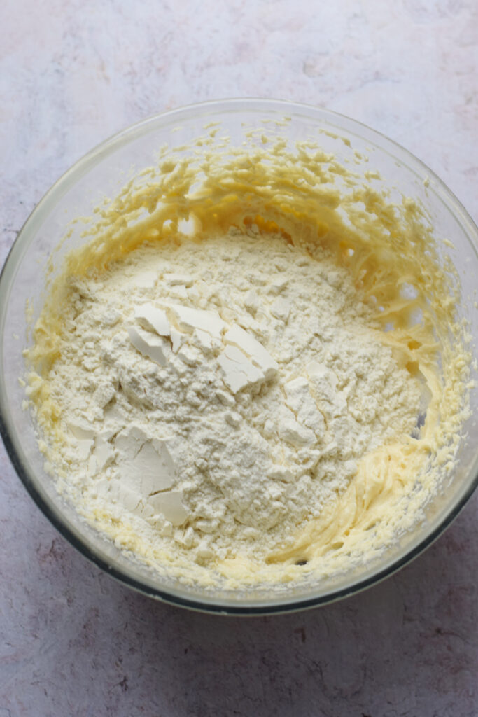 Making cupcake batter in a glass bowl.