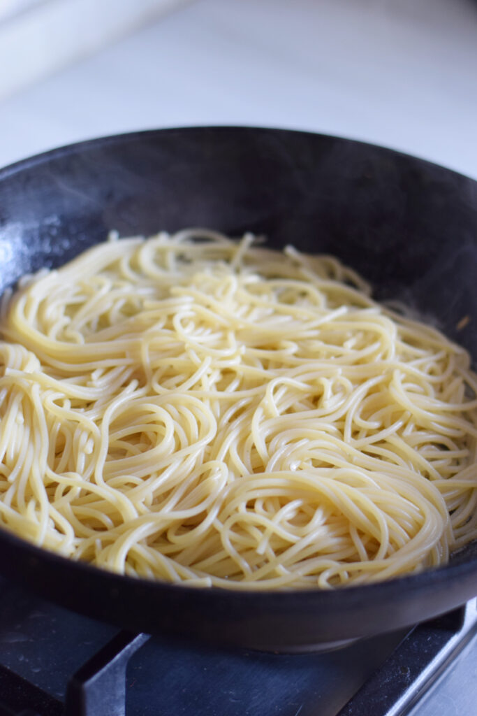 Spaghetti in a skillet.