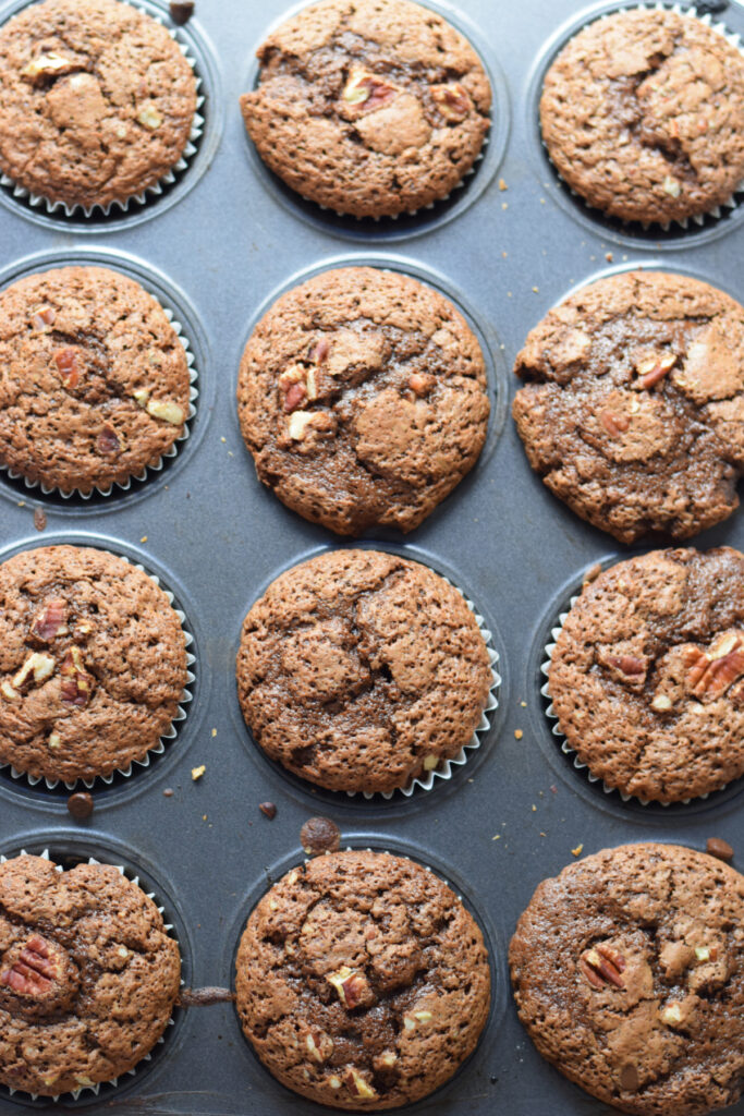 Baked muffins in a muffin tray.