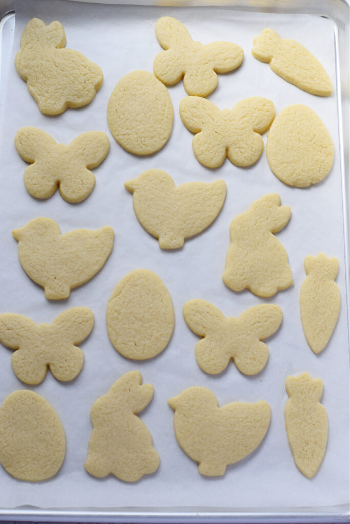 Baked sugar cookies on a tray.