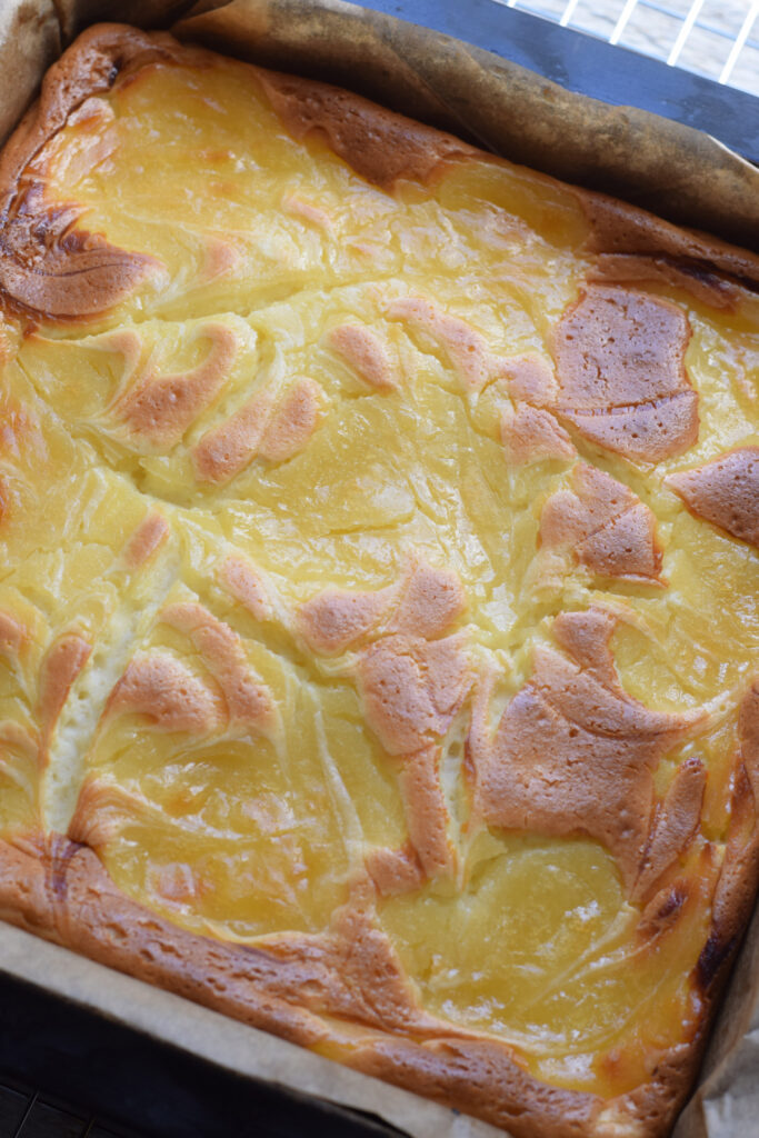 Baked lemon cheesecake bars.