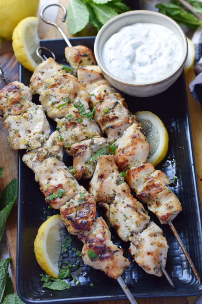 Chicken skewers with a dip.