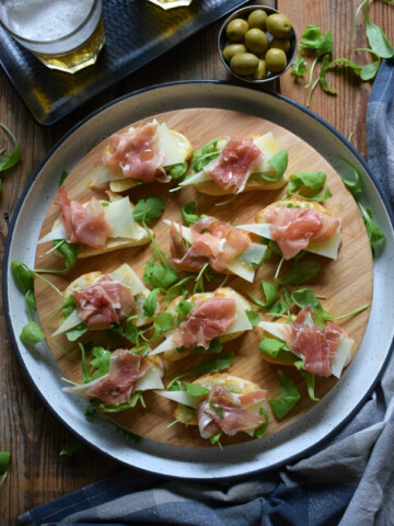 over head table view of the Spanish Serrano Ham and Cured Cheese Bruschetta