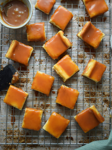 Cream Cheese Caramel Cookie bars on a cooling rack.