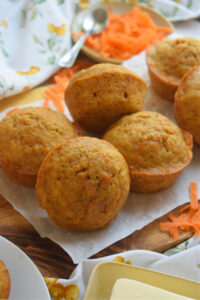 Carrot cake muffins on a white plate.