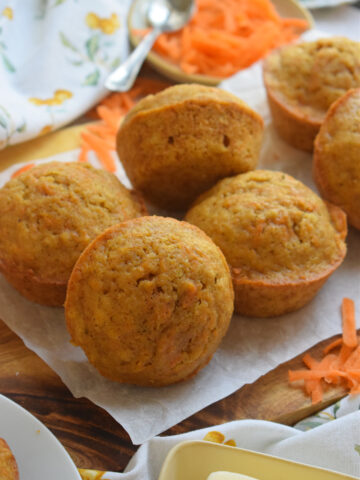 Carrot cake muffins on a white plate.