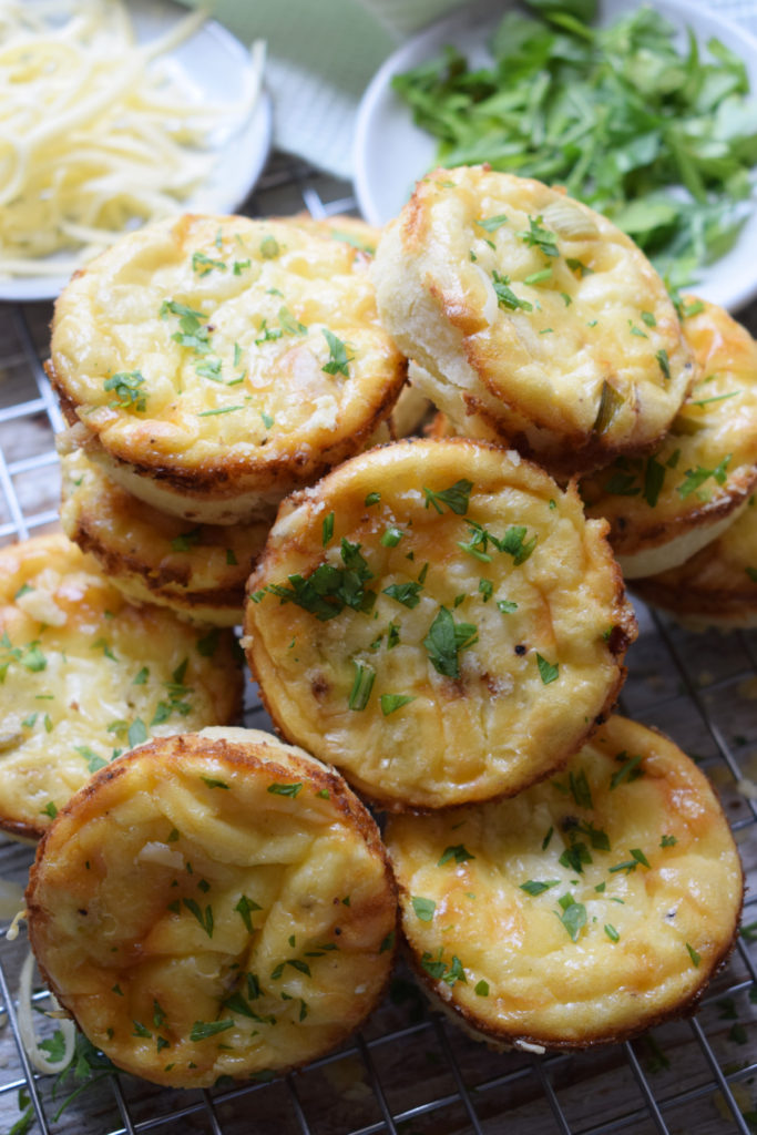 Mini quiche piled up.