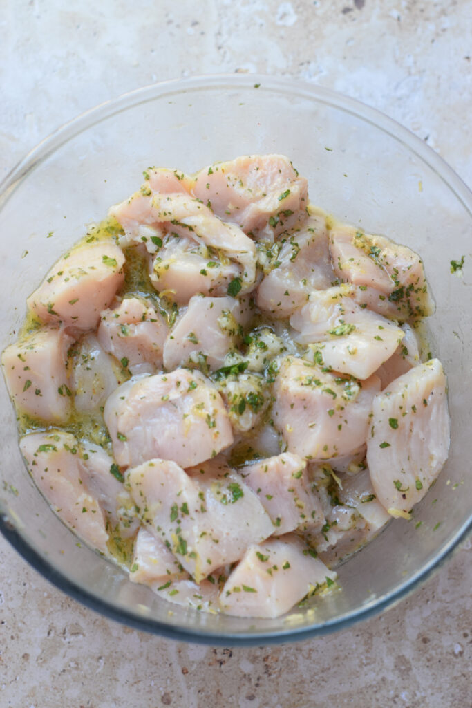 Marinaded chicken in a bowl.