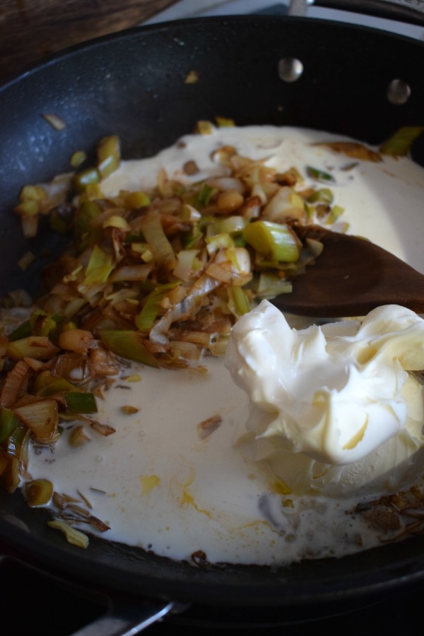 Add mascarpone cheese to leeks to make a sauce.