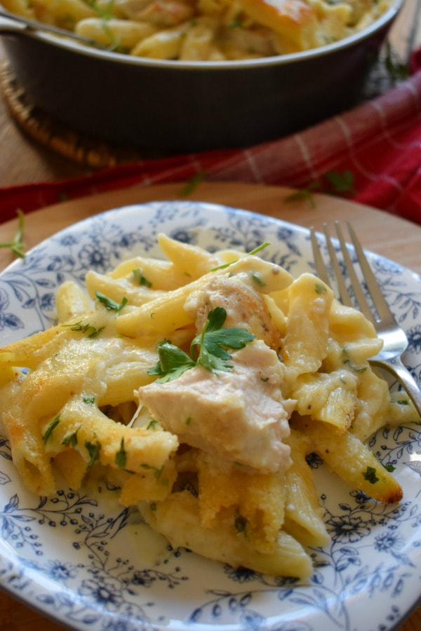 close up of the creamy chicken penne on a floral plate