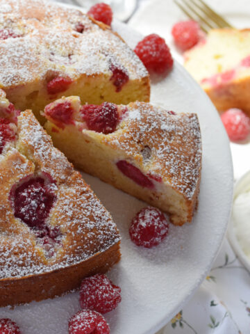Close up of a raspberry cake slice.