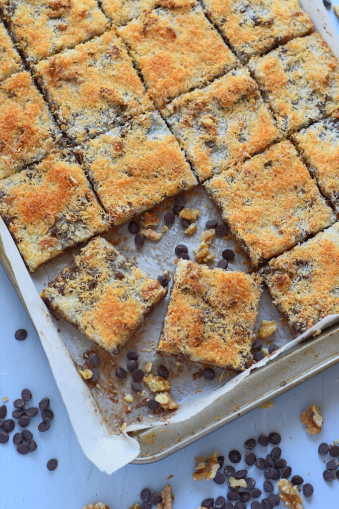 Chocolate coconut cookie bars in a tray.