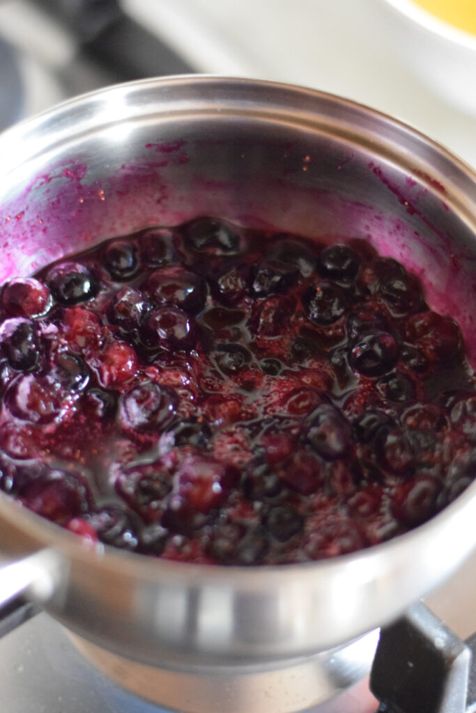 Blueberry compote in a saucepan.