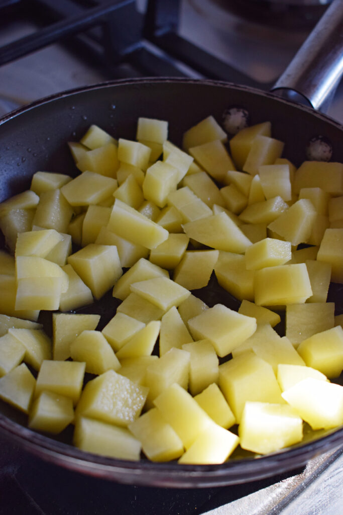 Cooking eggs in a skillet.