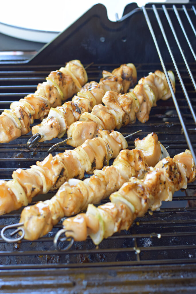 Grilled chicken on a barbecue.