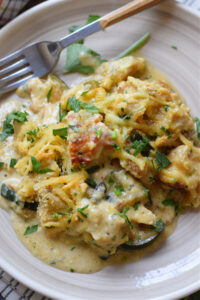 Casserole with chicken on a plate.