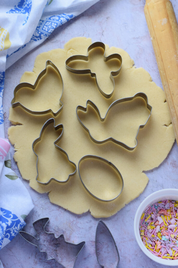 Cutting out cookies.