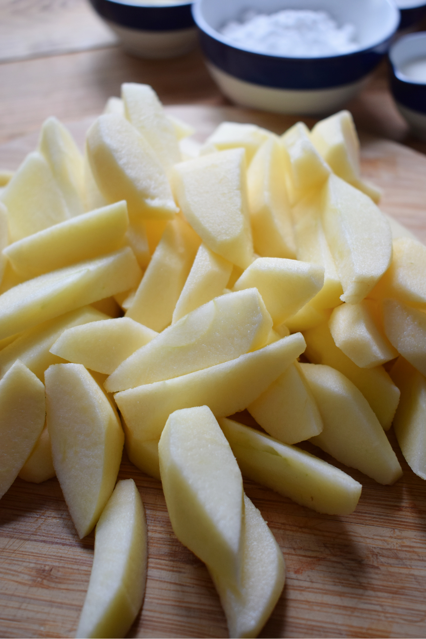sliced apples on a cutting board