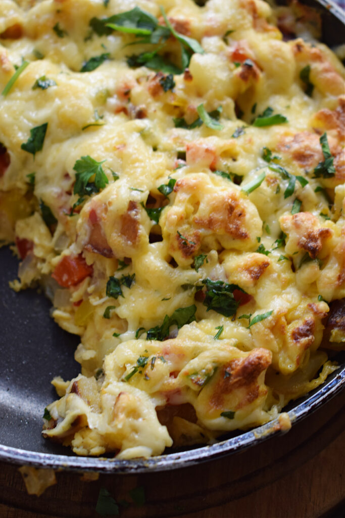 Close up of a breakfast casserole in a skillet.