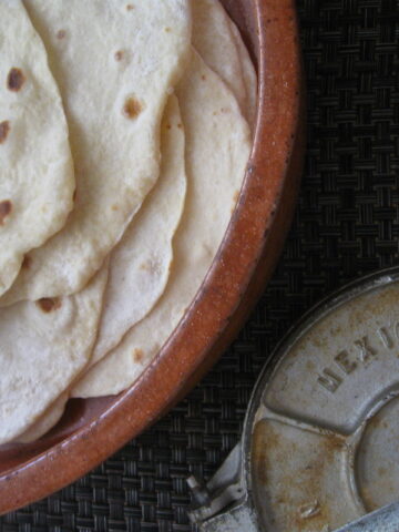 Homemade Flour Tortillas in a terra cotta dish