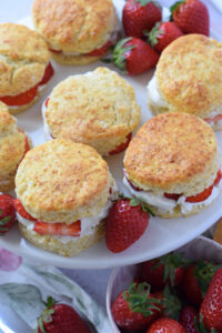 Strawberry scones on a white plate.