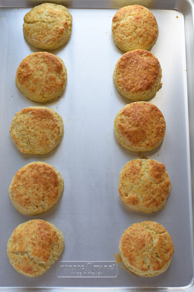 Baked scones on a baking tray.