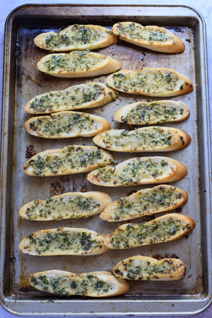 Crostini on a baking tray.