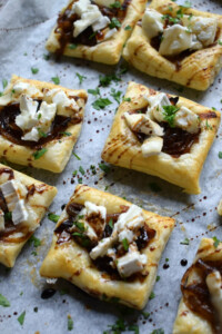 caramelized oinion tarts on a baking tray