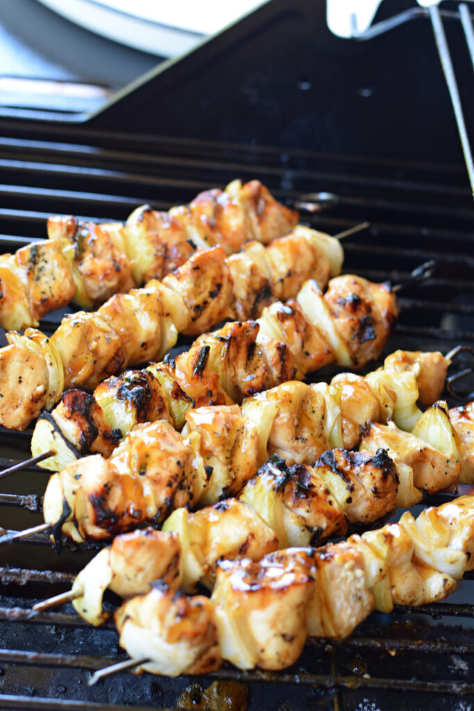 Grilled chicken on a barbecue.