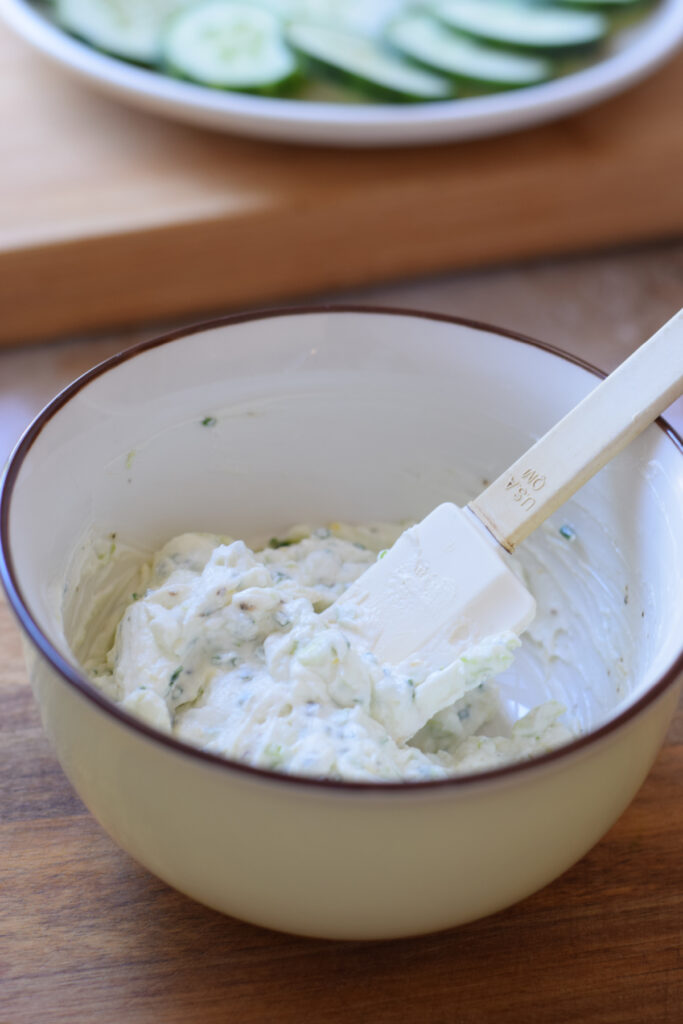 Herb cream cheese in a bowl.