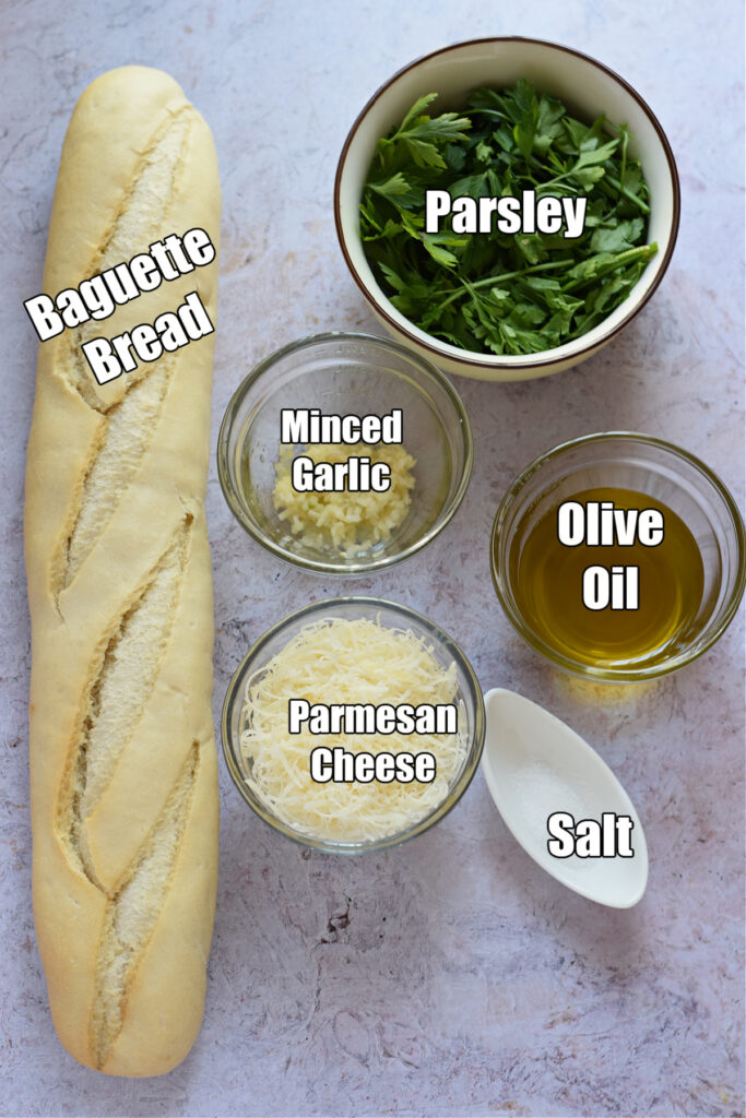 Ingredients to make garlic parmesan crostini.