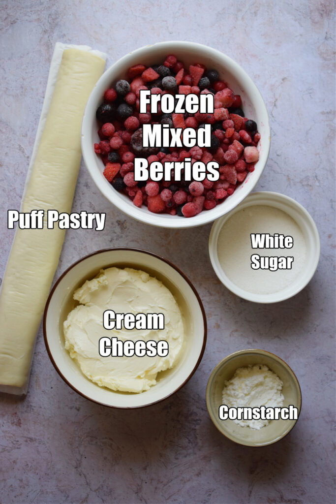 Ingredients to make a berry cream cheese danish.