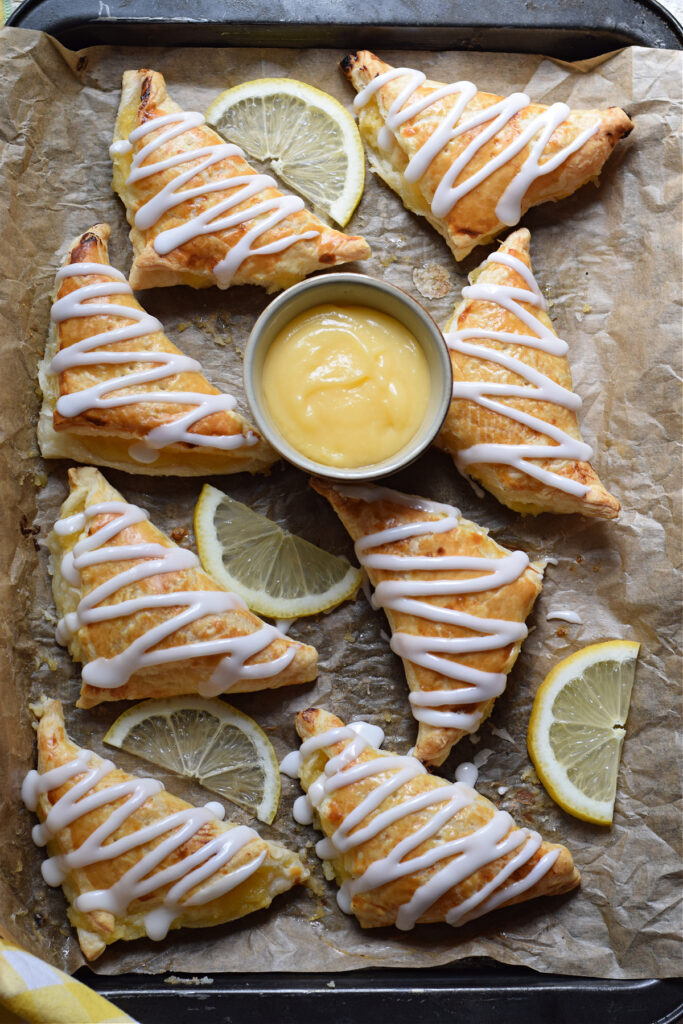 Lemon turnovers on a tray.