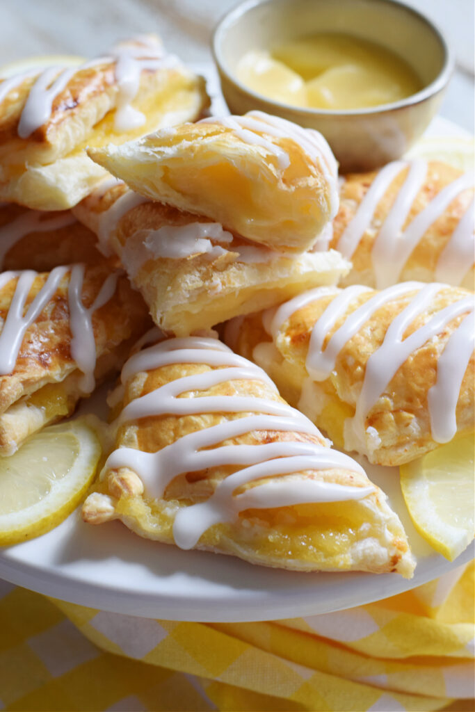 Lemon cream cheese turnovers on a plate.
