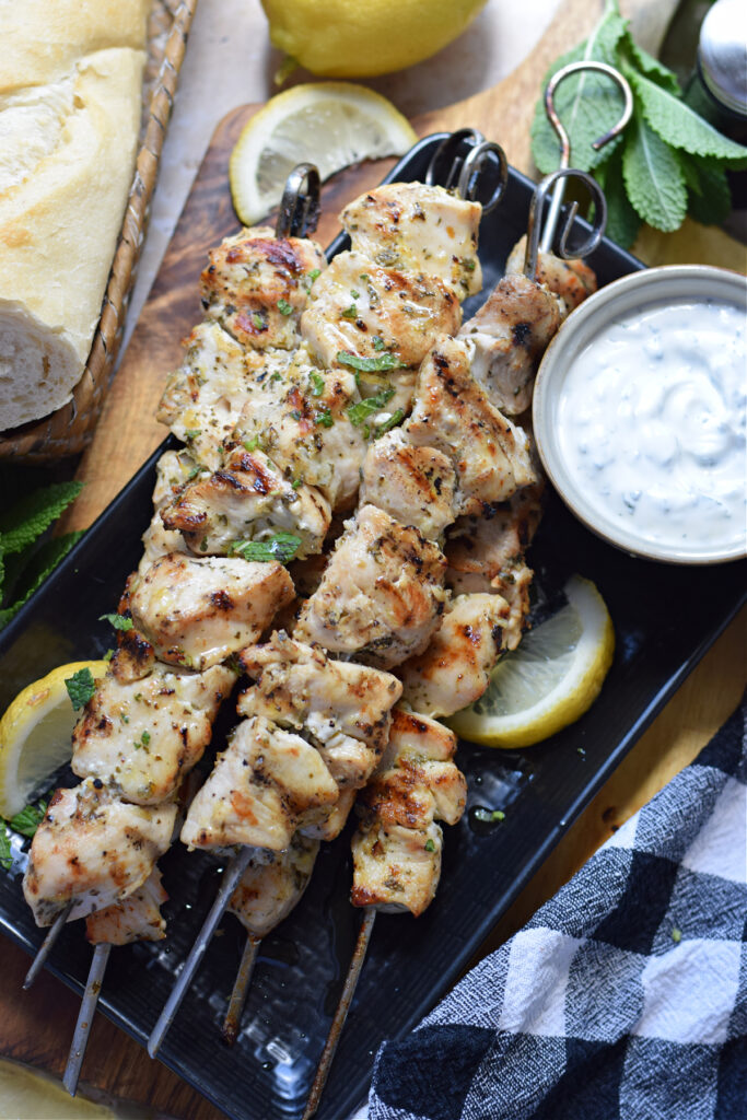 Chicken skewers with a dip.
