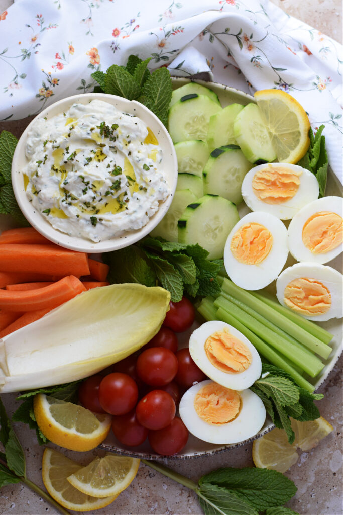 Lemon ricotta dip with a vegetable platter.
