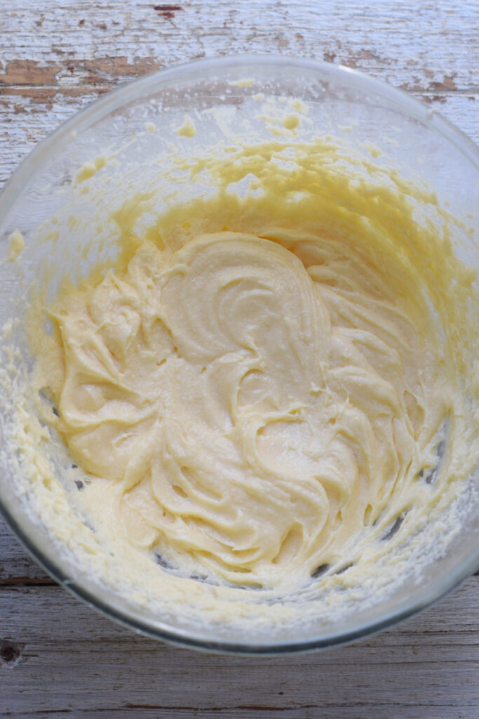 Muffin batter in a glass bowl.