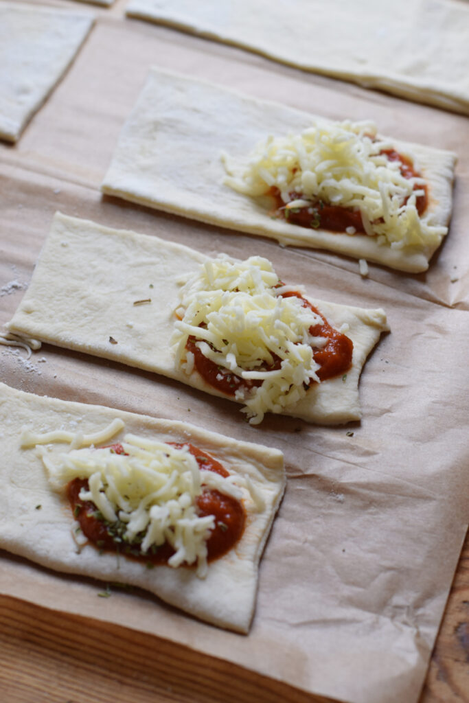 Making pizza pockets.