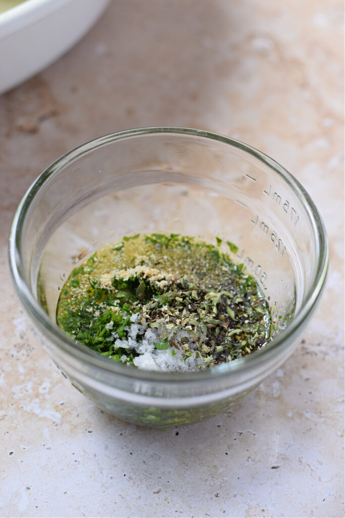 Marinade ingredients in a small glass bowl.