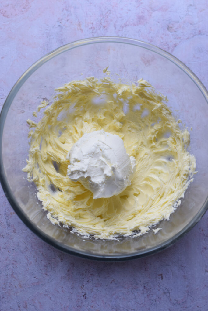 Butter and mascarpone cheese in a bowl.