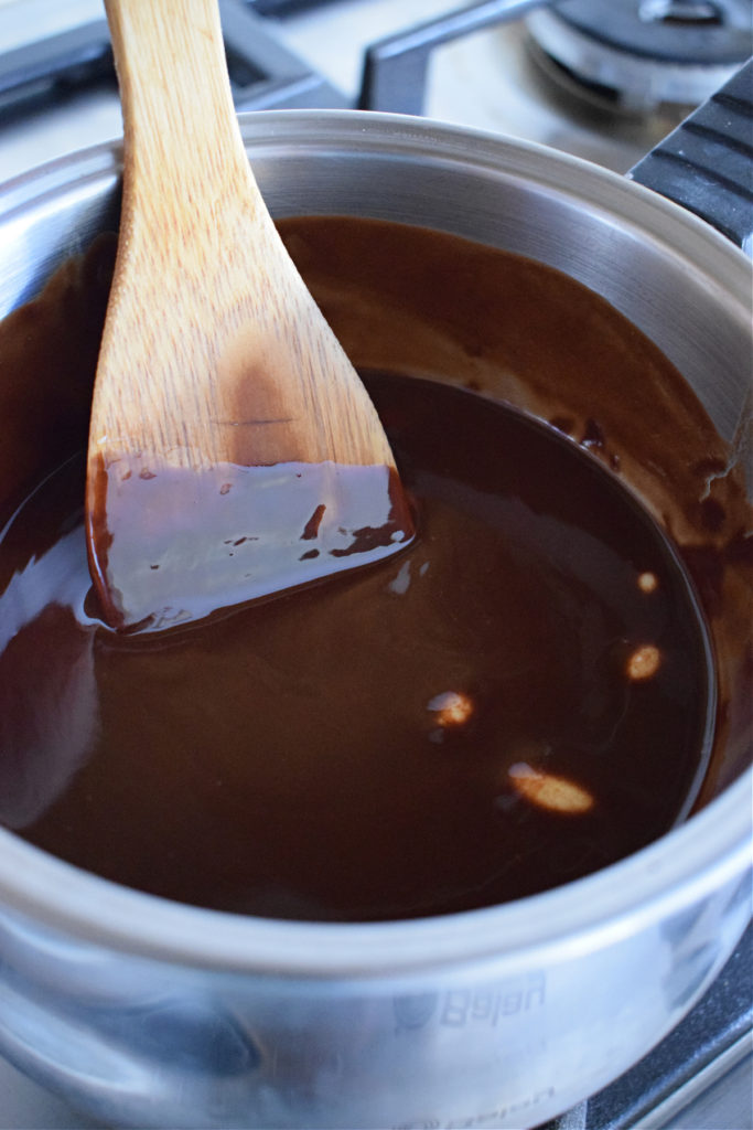 Melted butter and chocolate to make brownies.