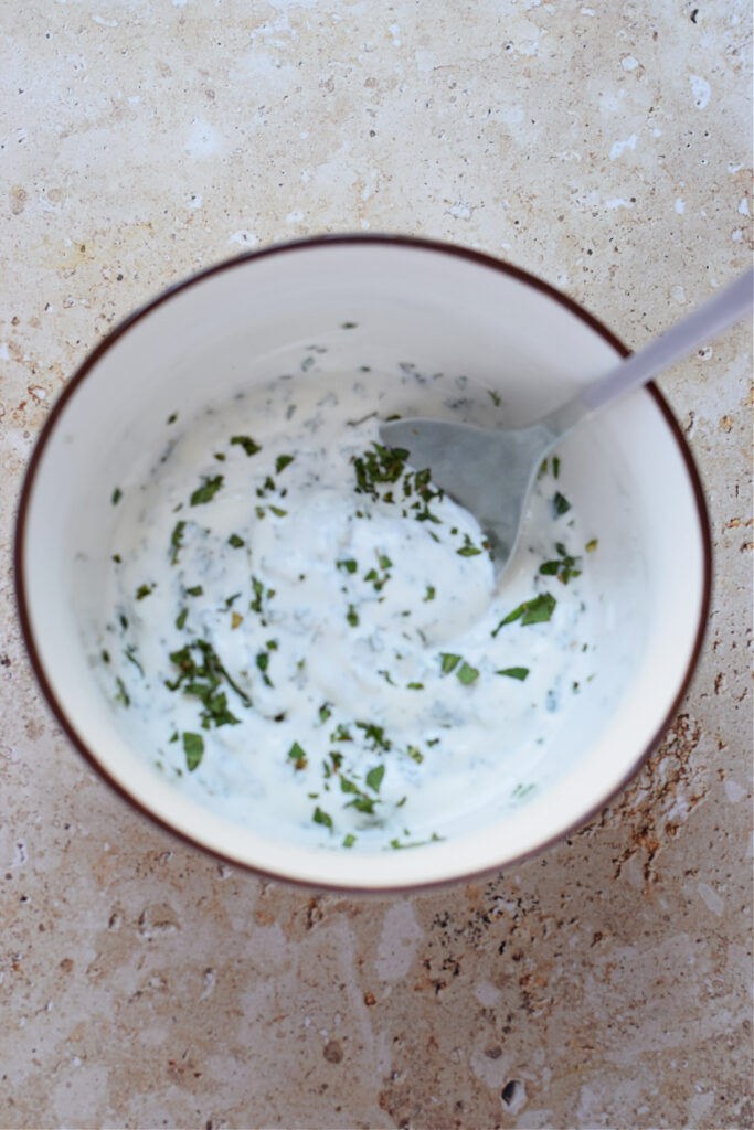 Minted yogurt dip in a bowl.