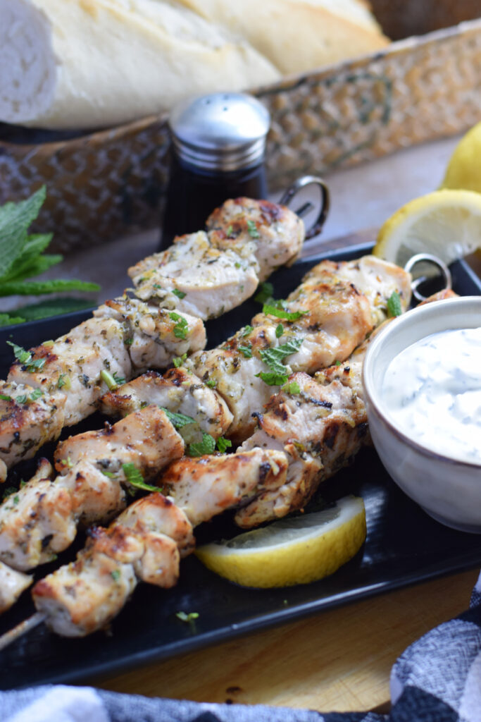Chicken skewers with a dip.