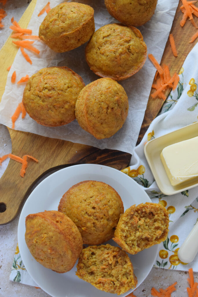 A serving platter of carrot cake muffins.
