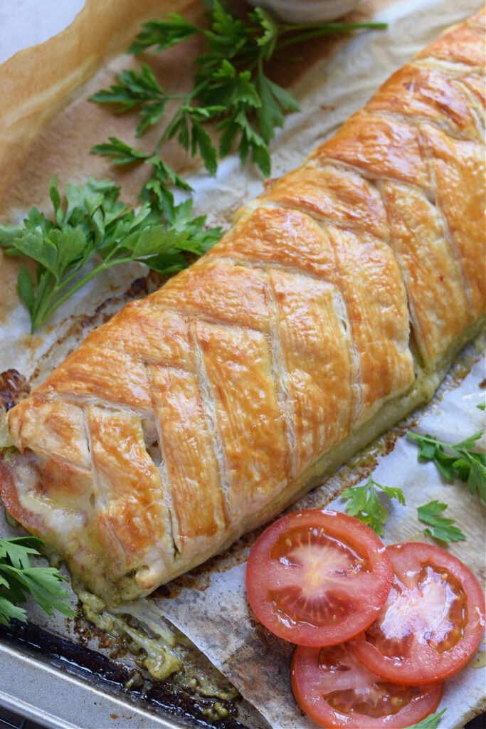 Pastry filled with pesto, tomatoes and cheese.