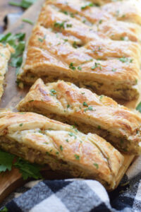 Mushroom pastry braid with a tea towel.