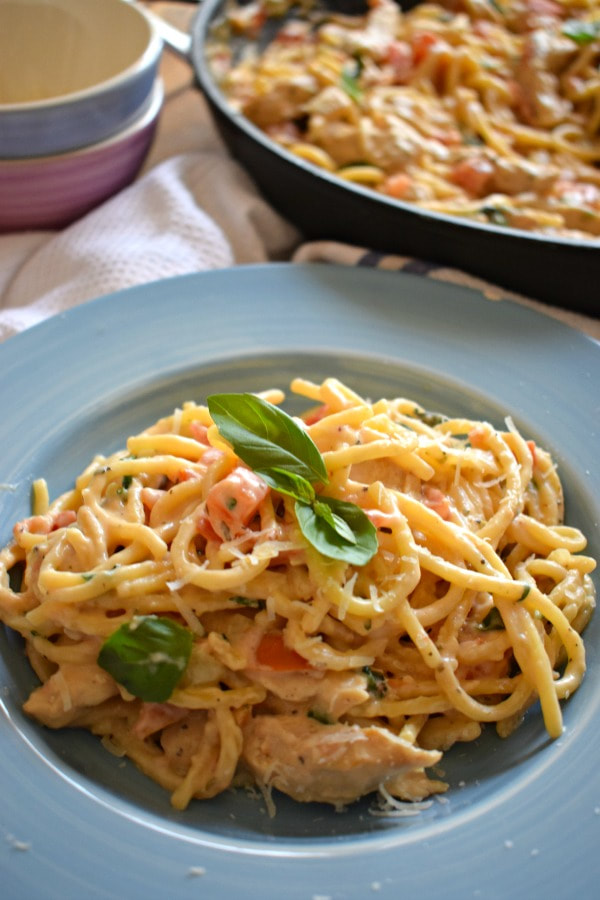 one pot creamy chicken pasta in a blue bowl