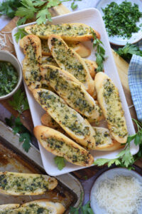 Crostini on a white plate.