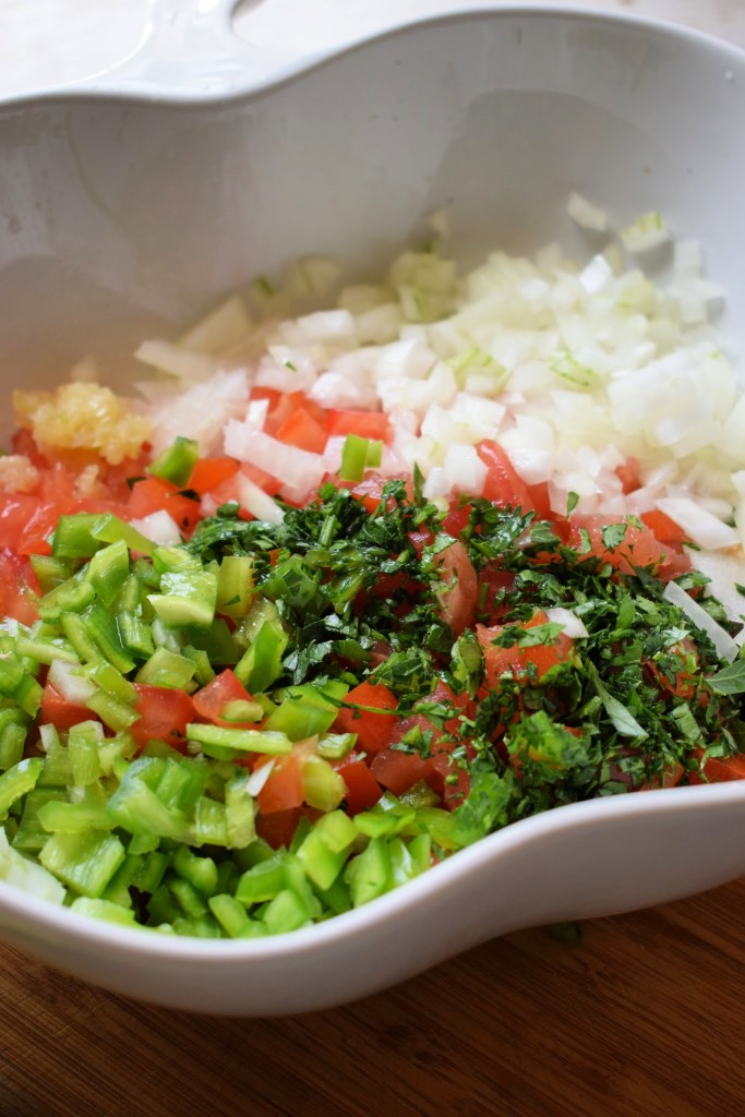Fresh ingredients in a bowl for pico de gallo