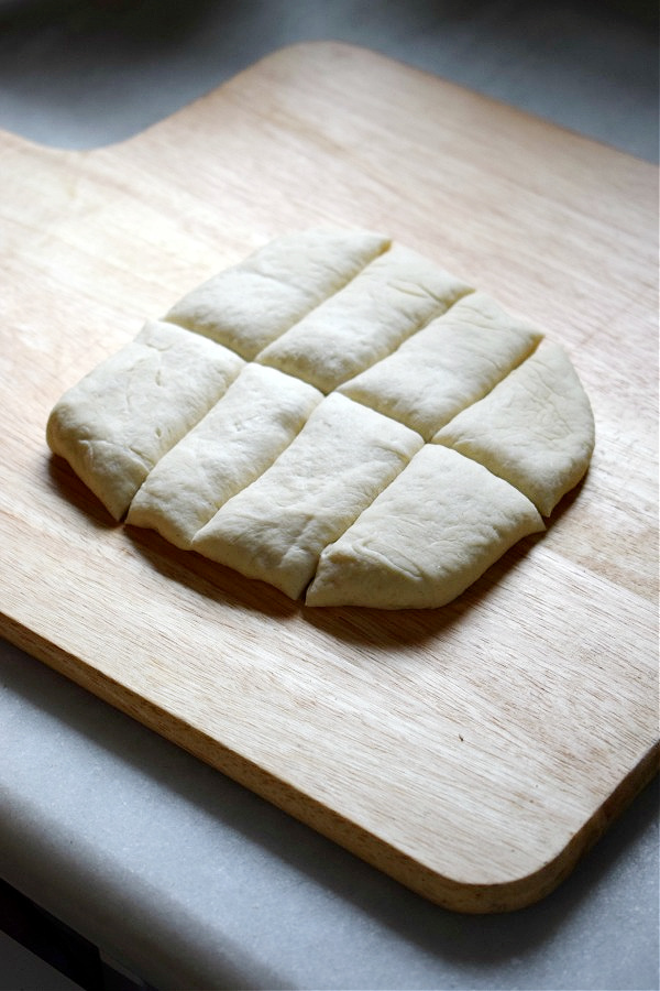 Pizza dough divided into strips